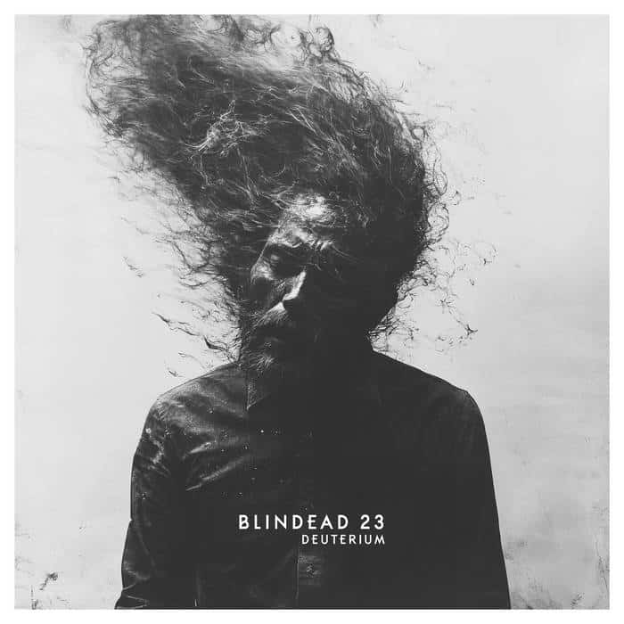 Black-and-white album cover showing a bearded man in a dark shirt with wild, wind-swept hair; the text 'BLINDEAD 23' and 'DEUTERIUM' appears at the bottom.
