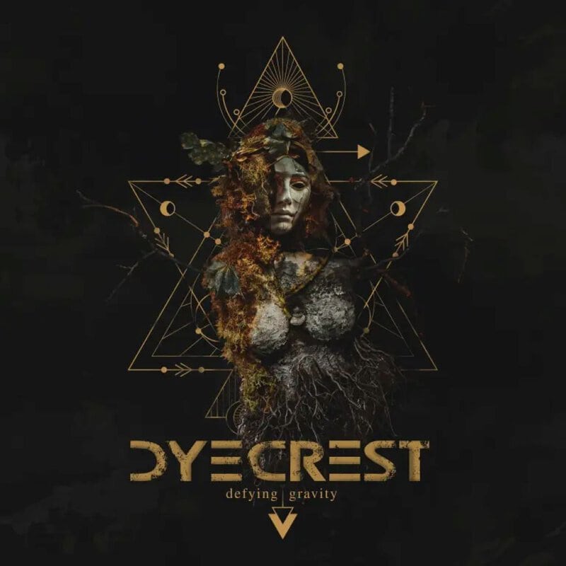 Abstract nature-inspired art cover: a masked figure with earth and leaves, gold geometric shapes, and the text 'DYECREST' with 'defying gravity' beneath.