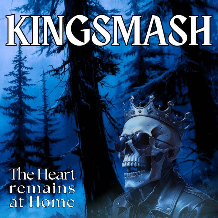 Album cover: Kingsmash—The Heart Remains at Home, showing a skull with a crown and sunglasses against a blue forest background.