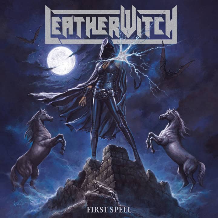 Album cover: a hooded sorceress in dark armor atop a rocky pedestal, cape flowing, with lightning from her hand, two rearing horses beside her, full moon and bats in a night sky, 'Earthbound' logo above and 'First Spell' at the bottom.
