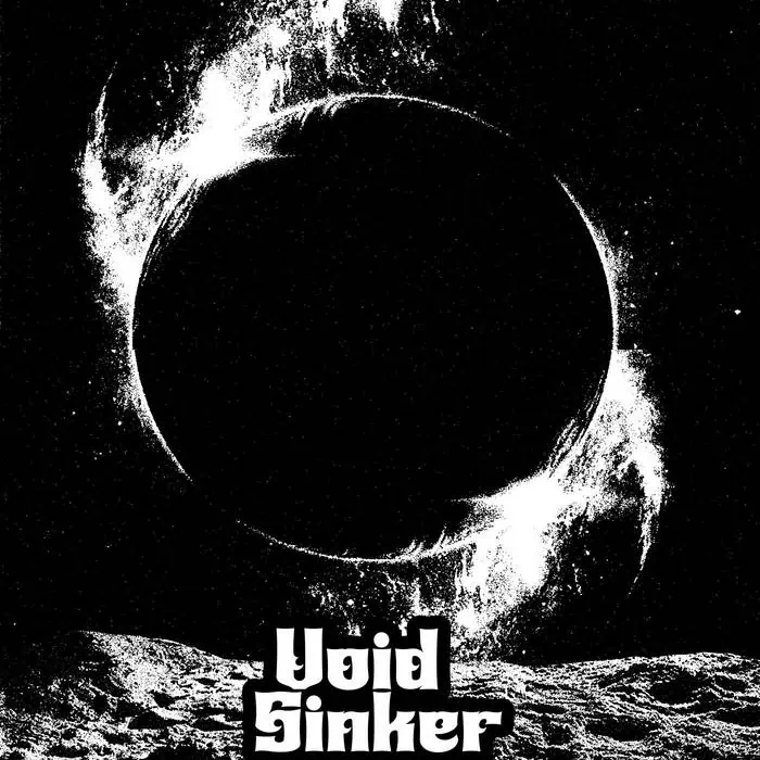 High-contrast black-and-white album cover showing a solar eclipse over a rough, textured surface with the title 'Void Sinker' in bold, blocky letters at the bottom.