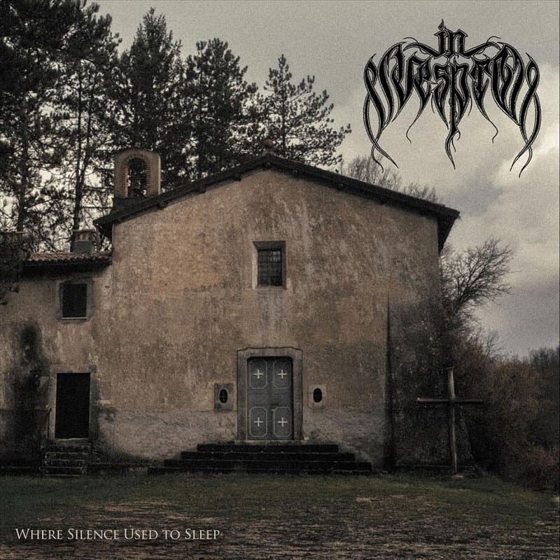 Gloomy, weathered church facade on a cloudy day with heavy doors; band logo in the top-right and the album title at the bottom.